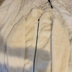 Selling a white soft and fuzzy sweater